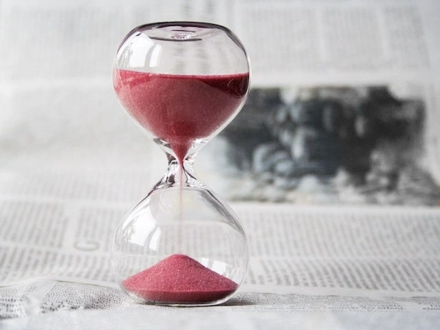 A hourglass filled with sand. 