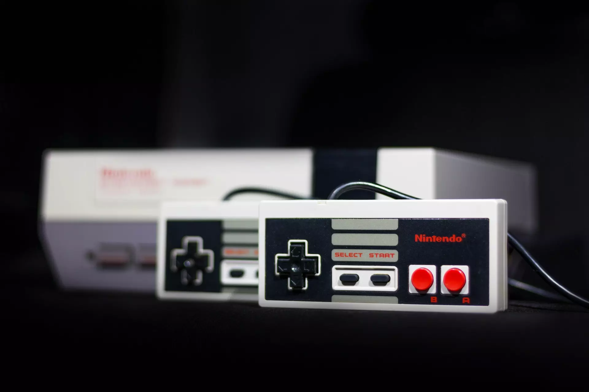 A close up of the Nintendo NES gaming system.